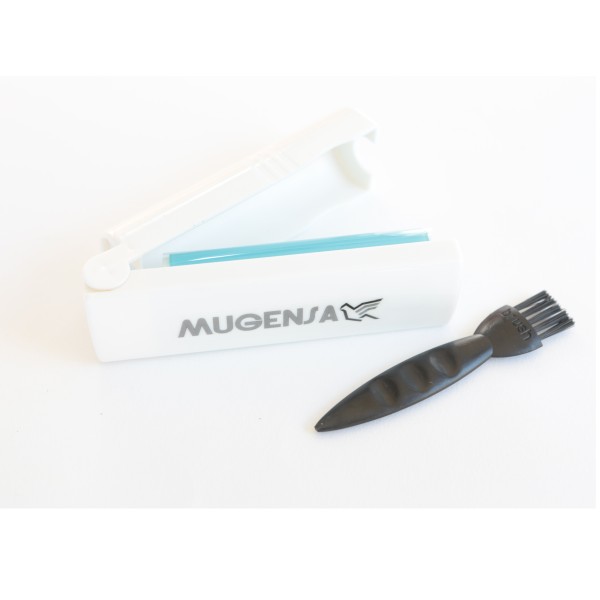 Close-up of bonus lint roller and brush